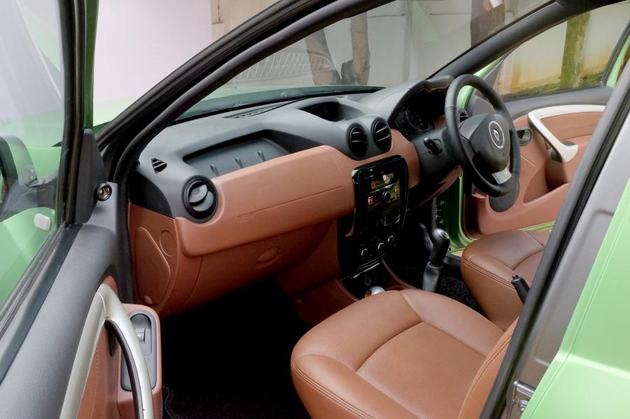 Интерьер Renault Duster by Kit Up Automotive 2017 года  (фото 7 из 8)